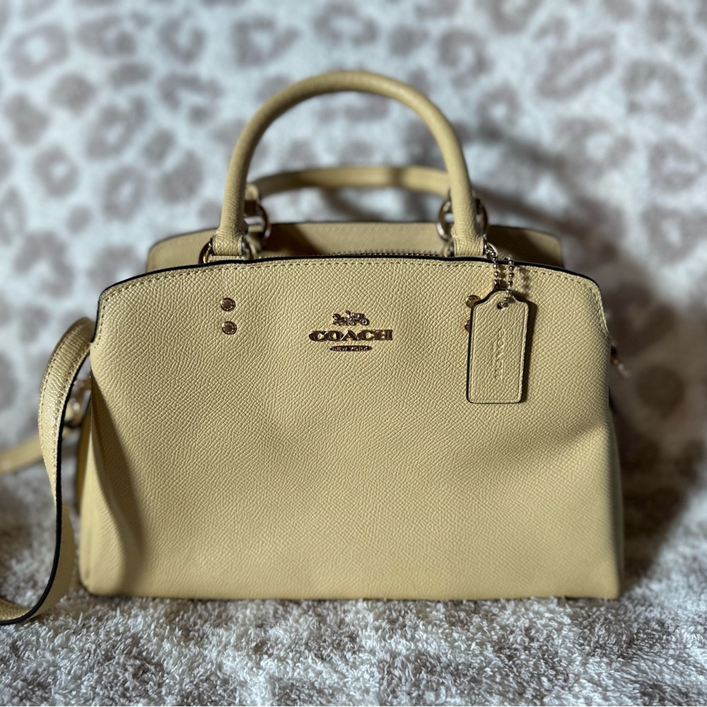 Pastel yellow Coach purse